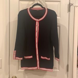 Navy cotton sweater with red and white trim with pearl buttons